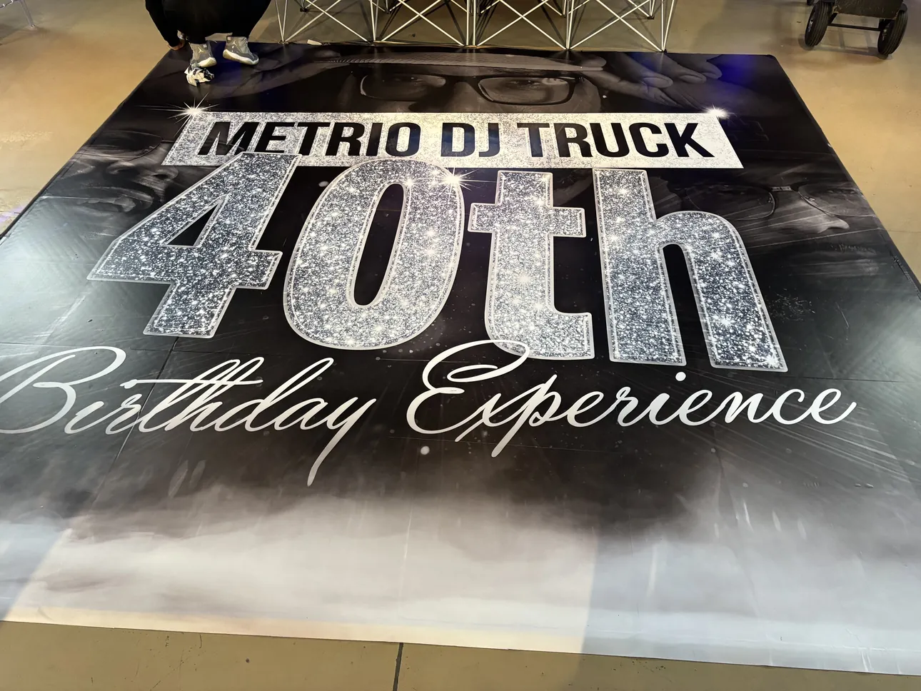 A silver 40th Birthday Experience dance floor wrap