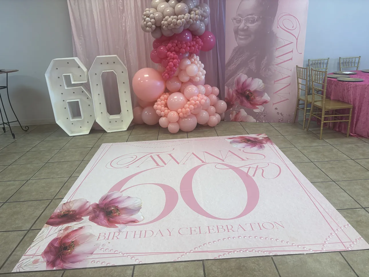 A pink 60th birthday dance floor wrap