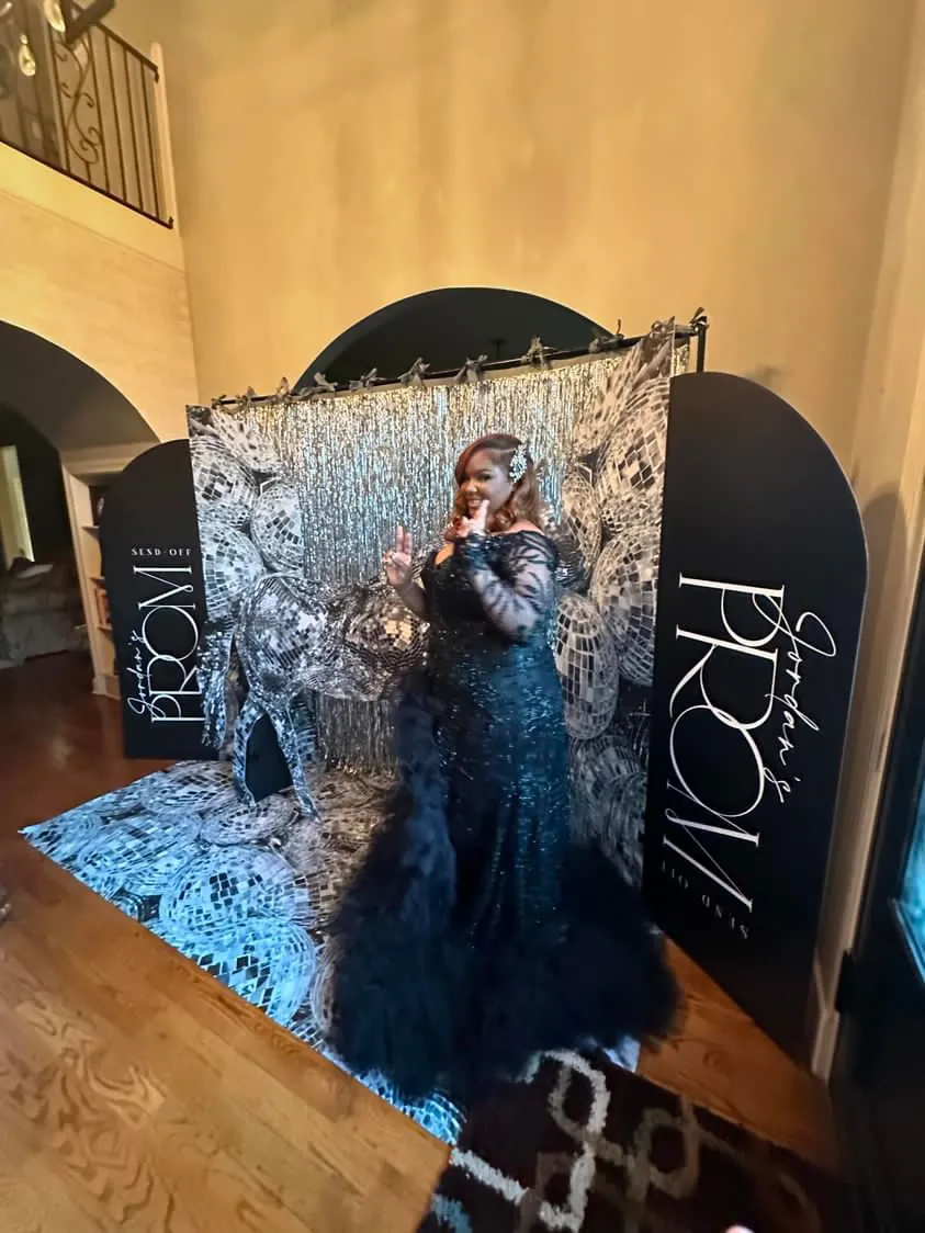 Two black arch panels reading Jordan's Prom Send Off at an at-home prom send-off